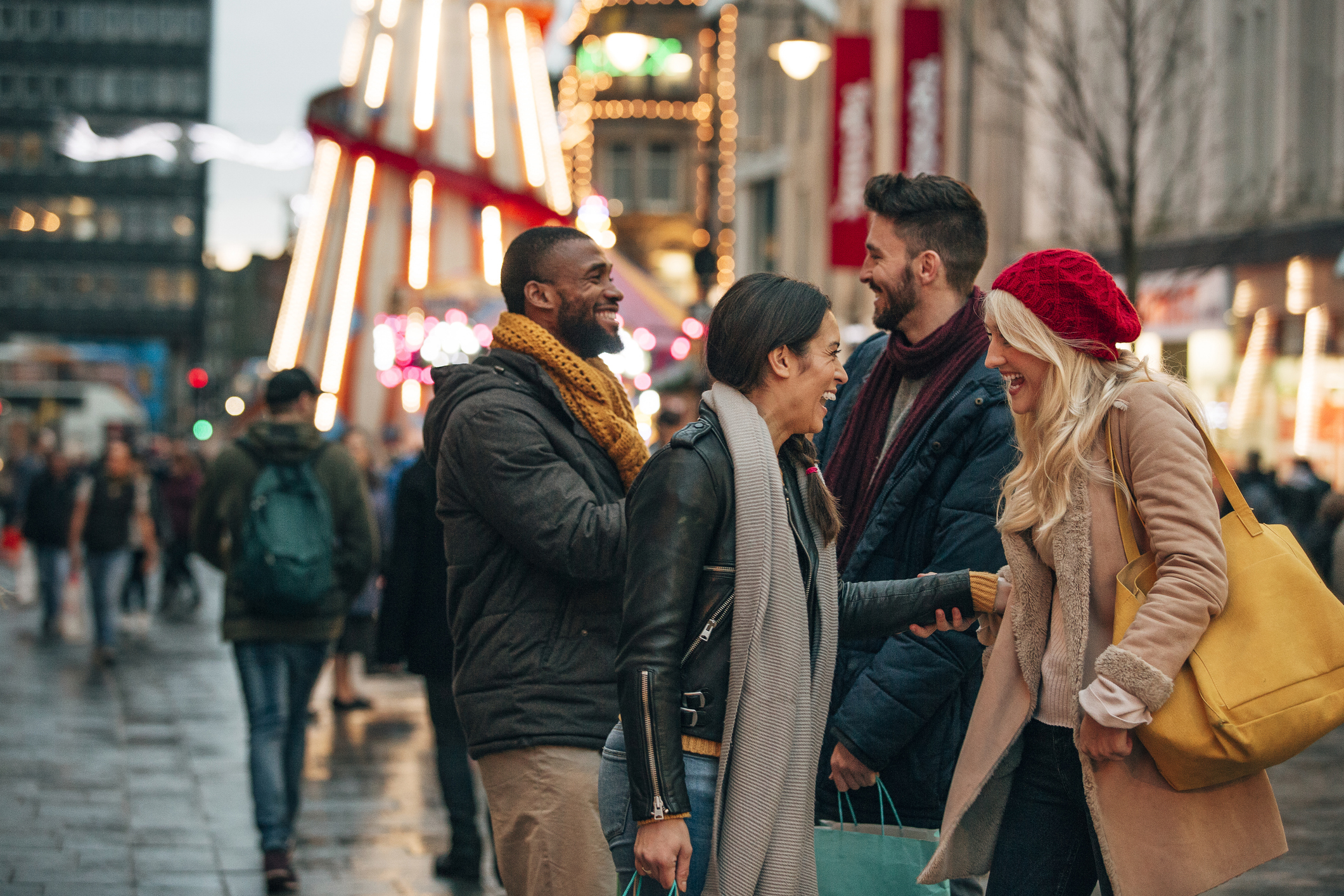 Two Couples Meeting on a City Street